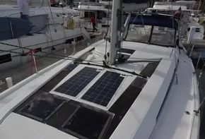 Beneteau Oceanis 46.1 2020 sailboat with solar panels on deck, docked at marina.