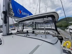 2020 Lagoon 42 catamaran docked, featuring a Sunsail sail and clear canopy.