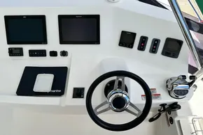 Leopard 53 Powercat 2022 helm with navigation screens and controls.