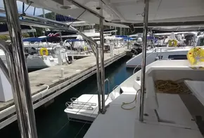Leopard 43 Powercat 2020 docked at marina with other boats.