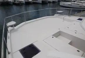 Leopard 43 Powercat 2020 model yacht docked at marina, spacious deck view.