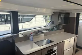 Modern kitchen interior on 2025 Leopard 46 yacht, featuring sleek countertops and appliances.