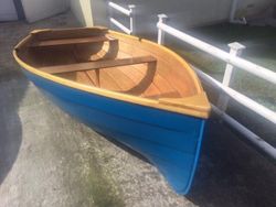 Brand new. 7’6” wooden dinghy.
