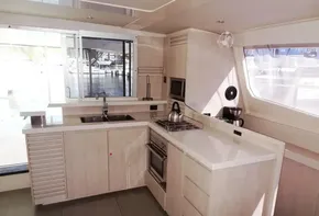 Modern kitchen interior on a 2015 Leopard 51 Powercat yacht.
