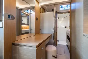 Luxurious interior of 2025 Leopard 46 yacht featuring modern wood finishes and elegant design.