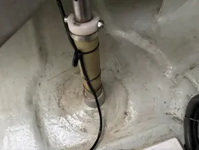 Boat interior detail of a 2019 Leopard 40, showing a secured cable and pole.