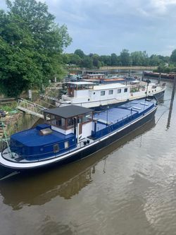 classic Dutch barge with residential mooring