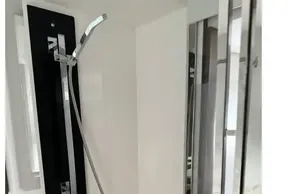 Modern shower area in 2022 Leopard 53 Powercat yacht bathroom.