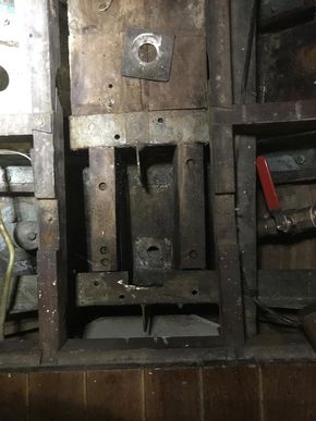 Bronze mast step removed to draw keel bolt for inspection