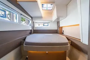 Luxurious interior cabin of 2025 Leopard 46 yacht with modern design and ample natural light.