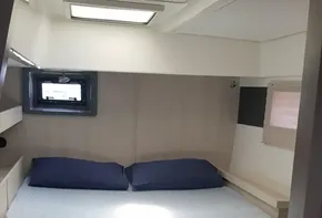 2017 Leopard 48 yacht bedroom with double bed and skylight.