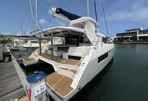 Leopard 45 catamaran docked at marina, 2019 model, rear view.