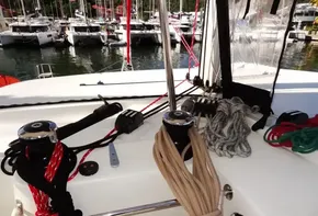 Lagoon 42 sailboat deck with ropes and winches, docked at marina, 2020 model.