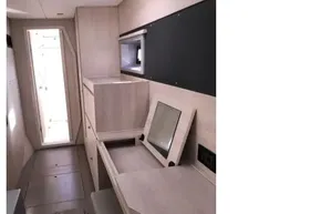 Modern interior of 2020 Leopard 40 yacht with sleek wooden finishes and compact design.