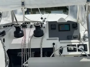 Cockpit of a 2020 Leopard 50 yacht with navigation instruments and winches.