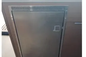 Stainless steel refrigerator in 2020 Lagoon 46 yacht kitchen interior.