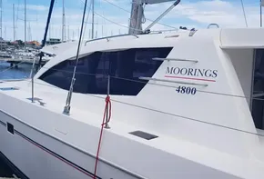 2017 Leopard 48 yacht Moorings 4800 docked at a marina.