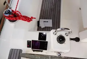 Beneteau Oceanis 38 2017 cockpit with navigation instruments and red rope.