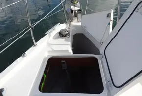 Beneteau Oceanis 46.1 2020 sailboat deck with open storage compartments.
