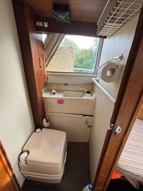 Toilet compartment with sink