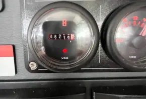 Close-up of Leopard 45 2019 boat dashboard with gauges and hour meter.