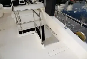 2018 Leopard 43 Powercat helm station and stairway to lower deck.