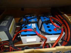 Battery compartment of 2017 Beneteau Oceanis 45 sailboat with wiring and connections.