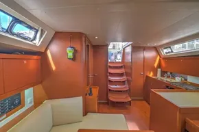 Interior of 2013 Beneteau Oceanis 41 sailboat with wooden finish and modern amenities.