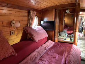 Bed at rear of boat