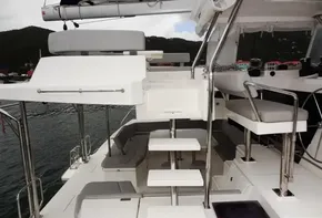 Modern Leopard 50 yacht interior, 2020 model, featuring sleek white seating and steps.
