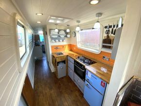 Looking after towards the washroom and generous rear cabin