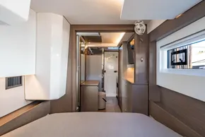 Luxurious interior of 2025 Leopard 46 yacht, featuring modern design and elegant wood finishes.