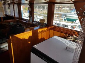 Upper deck dining/living/ galley/ bar.