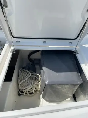 Storage compartment of a 2020 Leopard 50 yacht with rope and covered equipment.