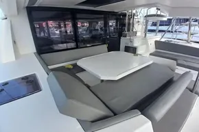 2022 Leopard 45 yacht interior with modern seating and dining area.
