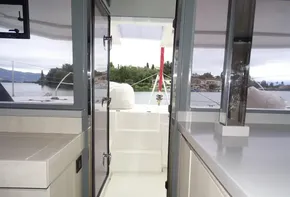 Interior view of 2017 Leopard 45 yacht, showcasing sleek design and outdoor access.