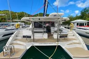 2020 Leopard 45 catamaran docked at marina, featuring spacious deck and modern design.