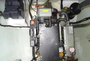 Engine compartment of a 2017 Leopard 45 catamaran, showcasing mechanical components and wiring.
