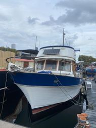 Beautiful Sea Chief 38 moored opposite Canary Wharf