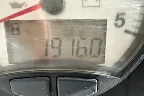 Close-up of a Leopard 50 dashboard displaying 1916.0 hours, 2022 model.