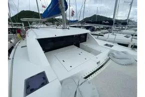 2020 Leopard 40 catamaran docked in marina, showcasing spacious deck and sleek design.