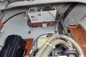 Engine compartment of a 2020 Lagoon 46 yacht with mechanical components and wiring.