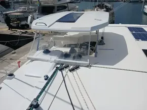 2019 Leopard 45 catamaran deck with ropes and solar panels in marina.