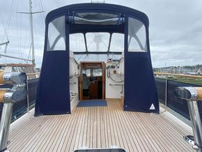 Teak laid aft deck - view fwd to upper helm and canopy