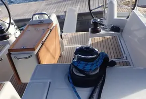 Jeanneau Sun Odyssey 440 sailboat deck, featuring winch and rope clutches, 2019 model.