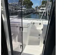Interior view of 2025 Leopard 46 yacht, showcasing sleek design and marina backdrop.
