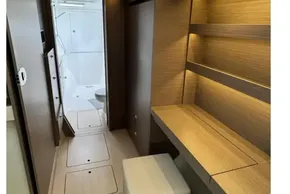 Luxurious interior of 2024 Leopard 40 Powercat with modern wood finish and sleek design.