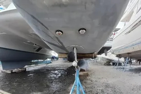 2024 Lagoon 42 catamaran hull and propeller in dry dock.
