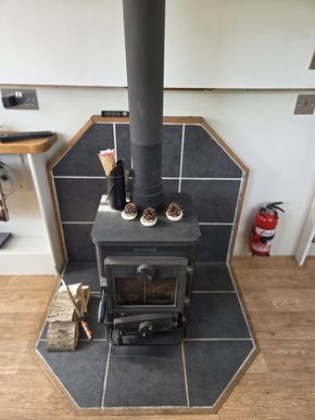 Morso Squirrel with back boiler linked to radiators throughout