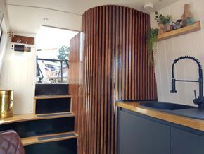 Fluted details on bespoke toilet 'pod'